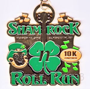 2013-03-17 Shamrock Medalx3.jpg - The finishers medal for the 10K